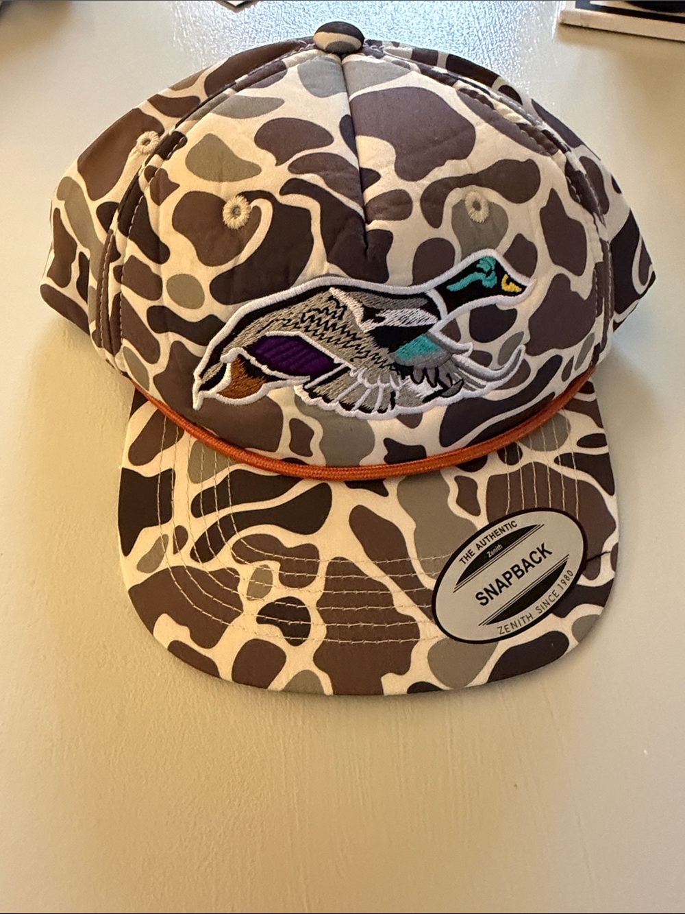 The Classic Brown and Cream Camouflage Snapback Hat with Embroidered Duck